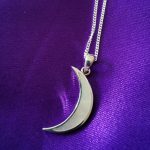Moon pendant inlaid with mother of pearl